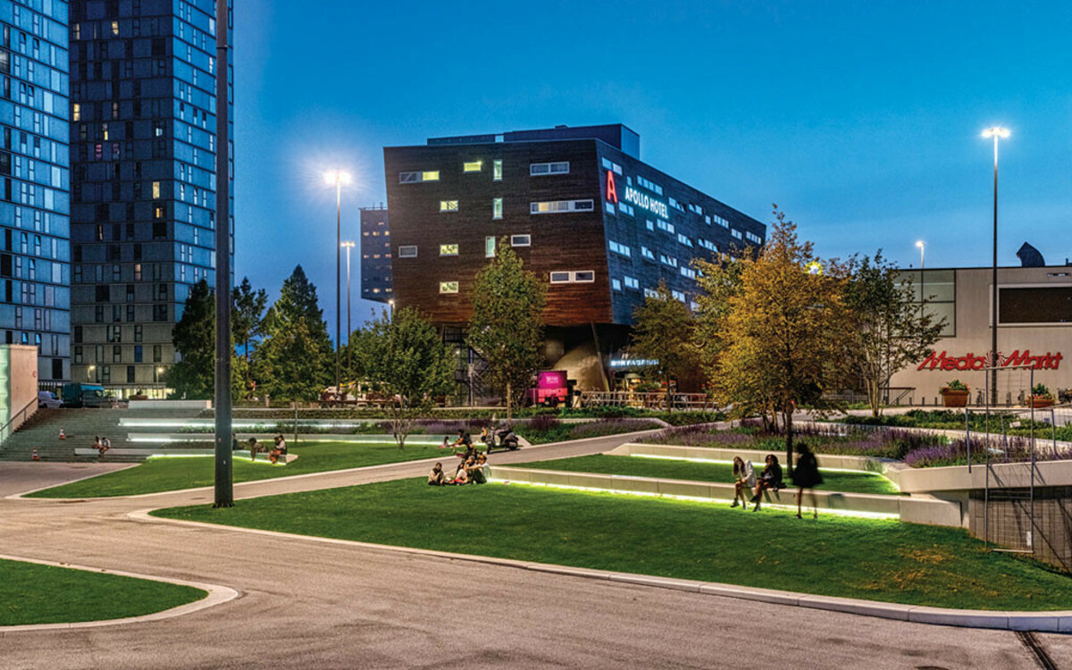 Parkbänke beleuchtet Beton